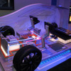 リチウムイオン電池の開発で主導権を握ろうと、家電メーカーも車両関連で出展。CES2011会場で