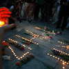 マレーシア航空17便の犠牲者に祈りを捧げる関係者（資料画像）