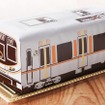 323系を模した「大阪環状線ケーキ」のイメージ。2月1日から販売される。
