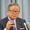 自見庄三郎金融・郵政担当相(21日・金融庁) 撮影=中島みなみ