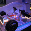 リチウムイオン電池の開発で主導権を握ろうと、家電メーカーも車両関連で出展。CES2011会場で
