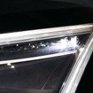 スタンレー電気ブースに展示されたレーザーヘッドランプ。6つのレーザー光源が用意される（写真：2つのレーザーが点灯しロービームの役割を果たす）