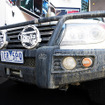 東京・銀座のソニービル前に展示された、泥だらけのランクル（オーストラリア仕様）。TOYOTA NEXT ONE の一環である「豪州大陸走破プロジェクト」で豪州を駆け抜けた1台