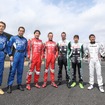 2014年の日産GT500ドライバーたち（開幕戦時）。今季も基本的には同様のラインナップとなった。左から安田、オリベイラ、松田、クインタレッリ、クルム、佐々木、本山、柳田。