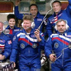 ISSに到着後、地上と交信を行う42Sクルー（手前左からスコット・ケリー宇宙飛行士、ゲナディ・パダルカ宇宙飛行士、ミカエル・コニエンコ宇宙飛行士）