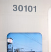 西武池袋線の開業100周年を記念して登場したヘッドマーク付き電車。両先頭車の側面にはかつての車両や、開業時から営業する12駅の写真をデザインしたステッカーを貼っている