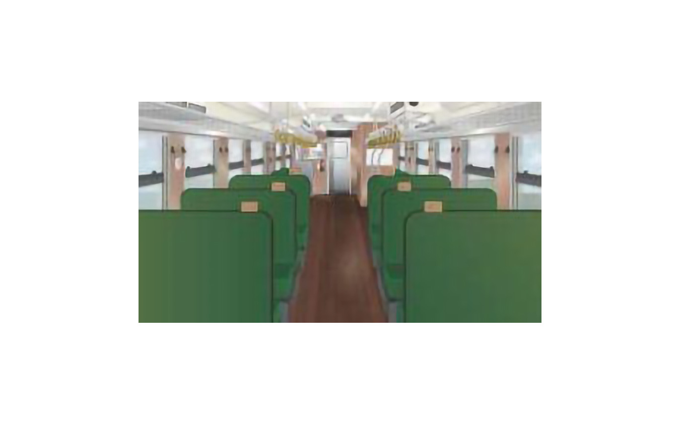 車内のイメージ。岡山県北部の山や自然をモチーフにグリーンやブラウンを基調とした落ち着いたもので、各座席にはテーブルが設けられる。
