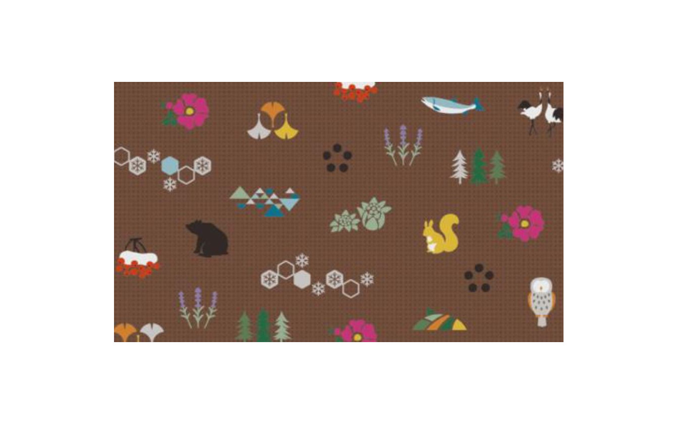 タンチョウやヒグマ、エゾリス、エゾマツなどのイメージを散りばめた座席の生地。