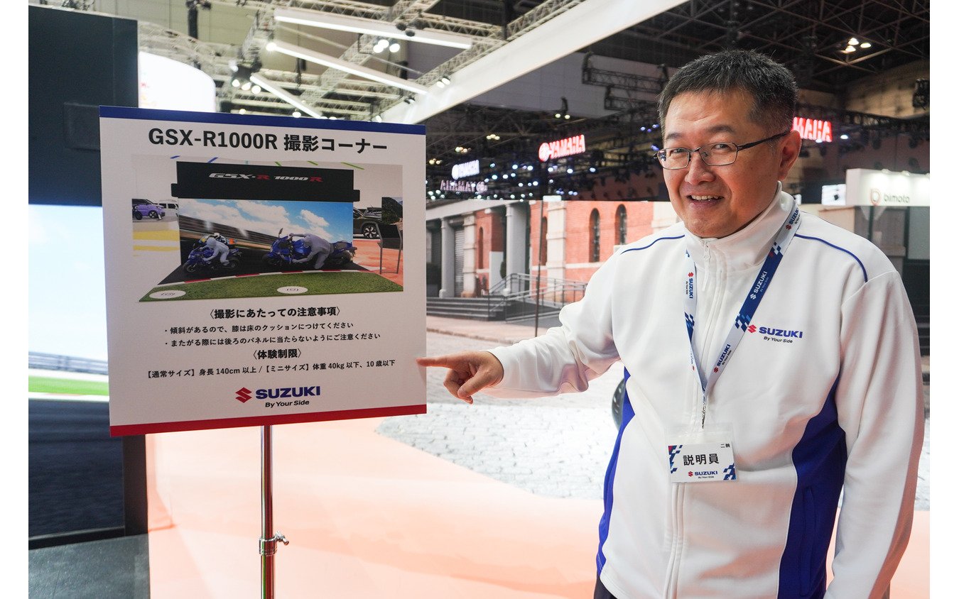 e-PO、CNチャレンジ ミニの開発者神谷洋三さん。「ミニGSX-R」の体験は40kg以下、10歳以下ですよ、と注意喚起