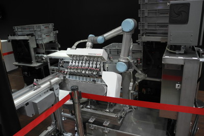 マツダの子会社、おにぎり箱詰めロボットで食品機械業界に殴り込み---価格5分の1を狙う 画像