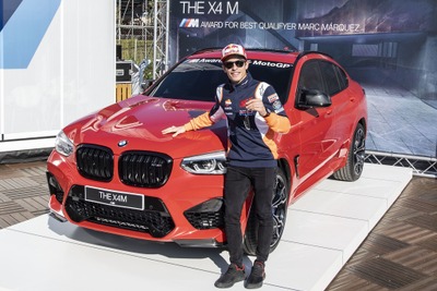 BMW X4 に510馬力の「M」、MotoGP 予選最速のマルク・マルケス選手が獲得 画像