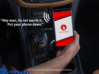GM、運転中のスマホ操作抑制アプリ開発…警告画面とメッセージで 画像