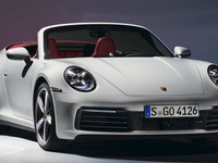 ポルシェ『911』、史上初の電動化へ…今夏発表の改良新型に高性能ハイブリッド設定 画像