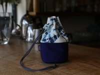 廃棄素材のエアバッグ生地と鹿革から生まれた「エシカルな巾着」、豊田合成が発売へ 画像