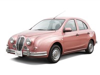 光岡 ビュート に桜色ボディの特別仕様車 画像