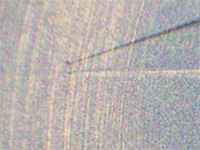 JAXA、「はやぶさ」が持ち帰った小惑星「イトカワ」の微粒子を公開展示 画像