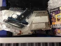 プレステ2の中に22口径の拳銃を隠し密輸を企てた男があっけなく逮捕 画像