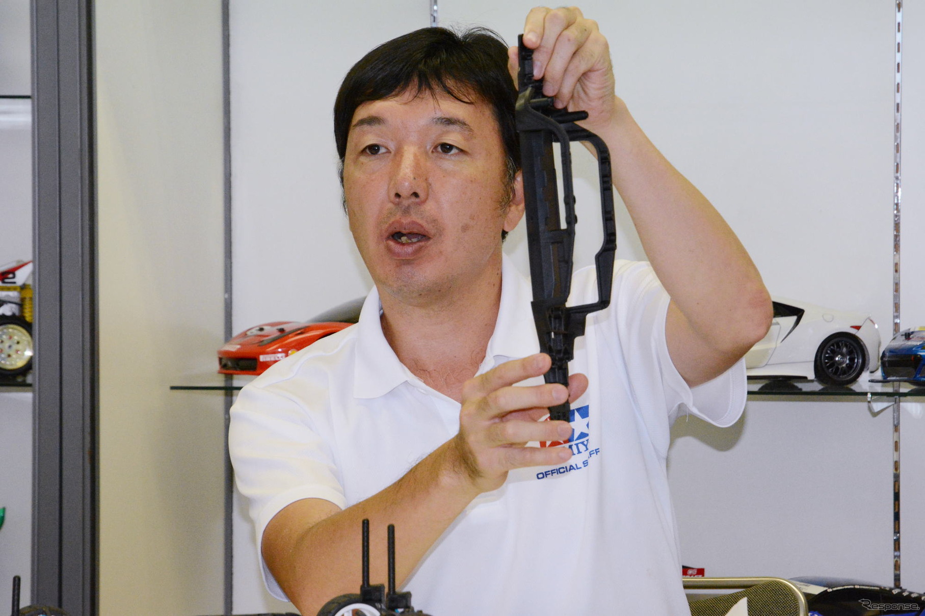 説明する青木主任