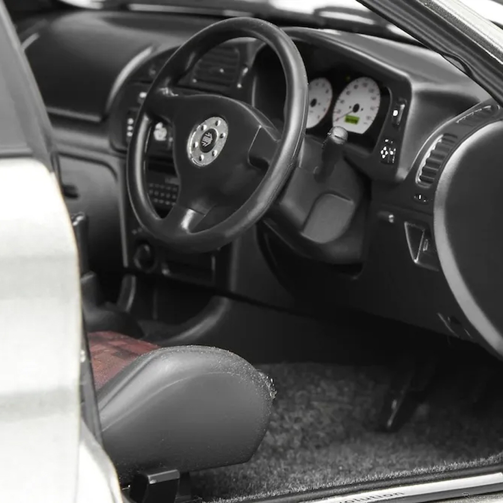 三菱『ランサーエボリューションIV』の18分の1スケールミニカー