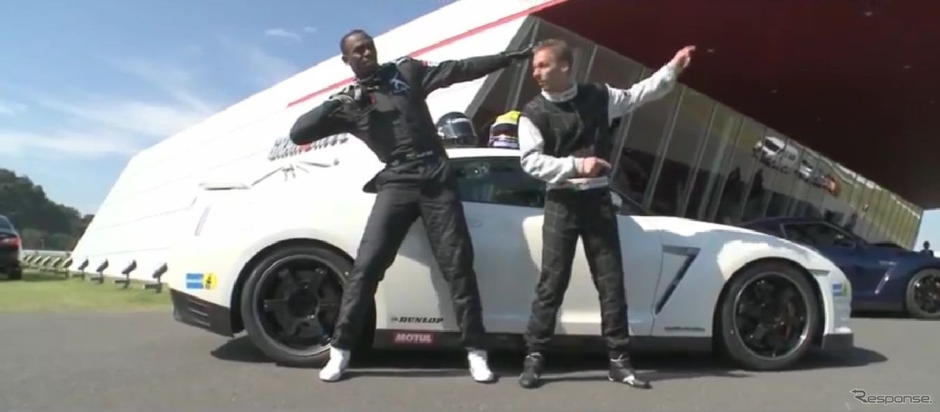 ミハエル・クルム選手のレクチャーを受けながら、日産GT-Rに試乗したウサイン・ボルト選手