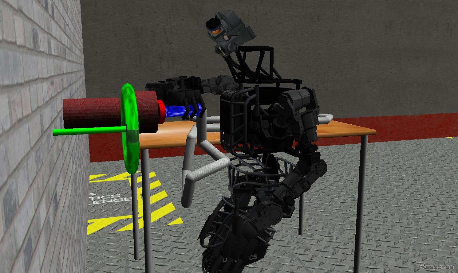 DARPAバーチャル・ロボティクス・チャレンジ課題の一つ。ホースを拾ってパイプにつなぎ、バルブを回す動作をシミュレーター上で行う