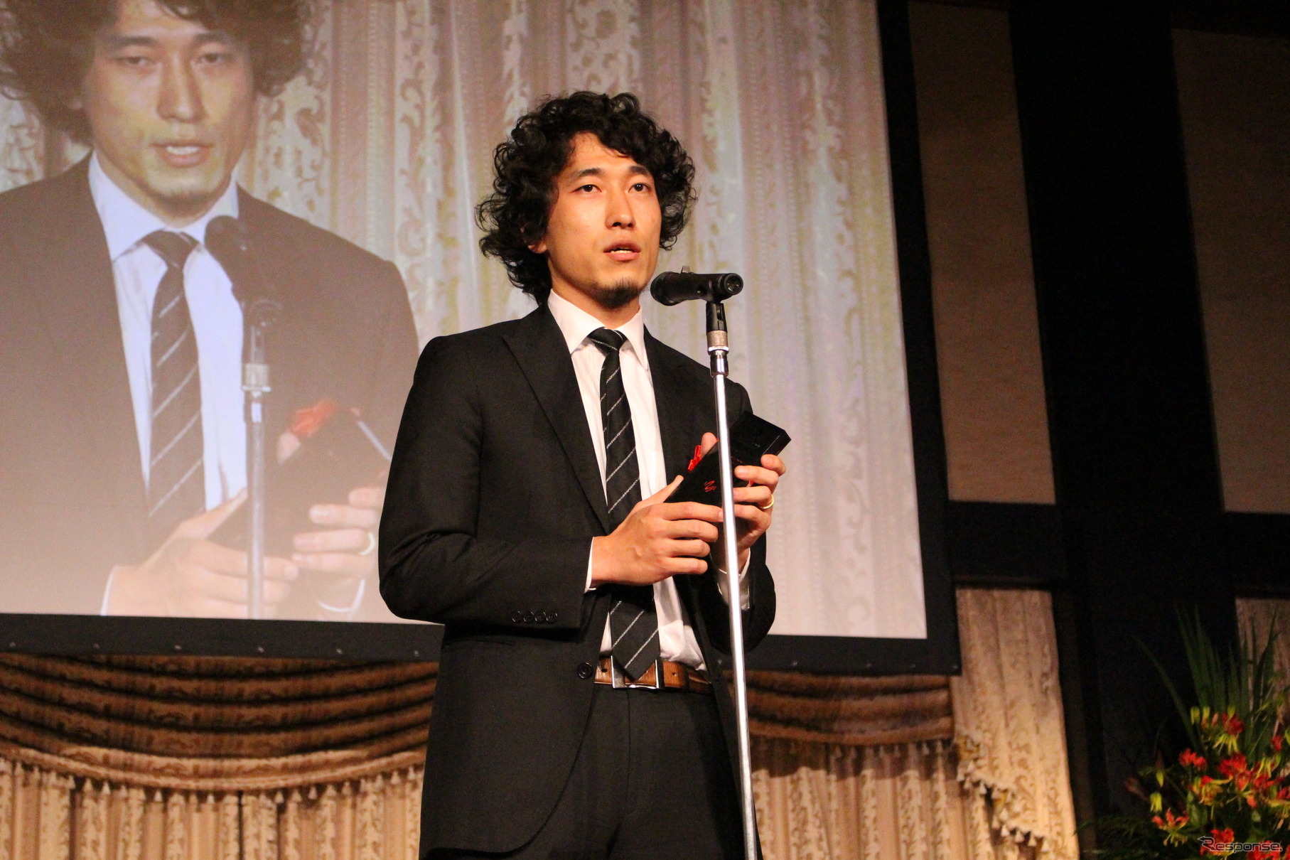 年間コンテンツ賞を受け取った電通の保持壮太郎氏