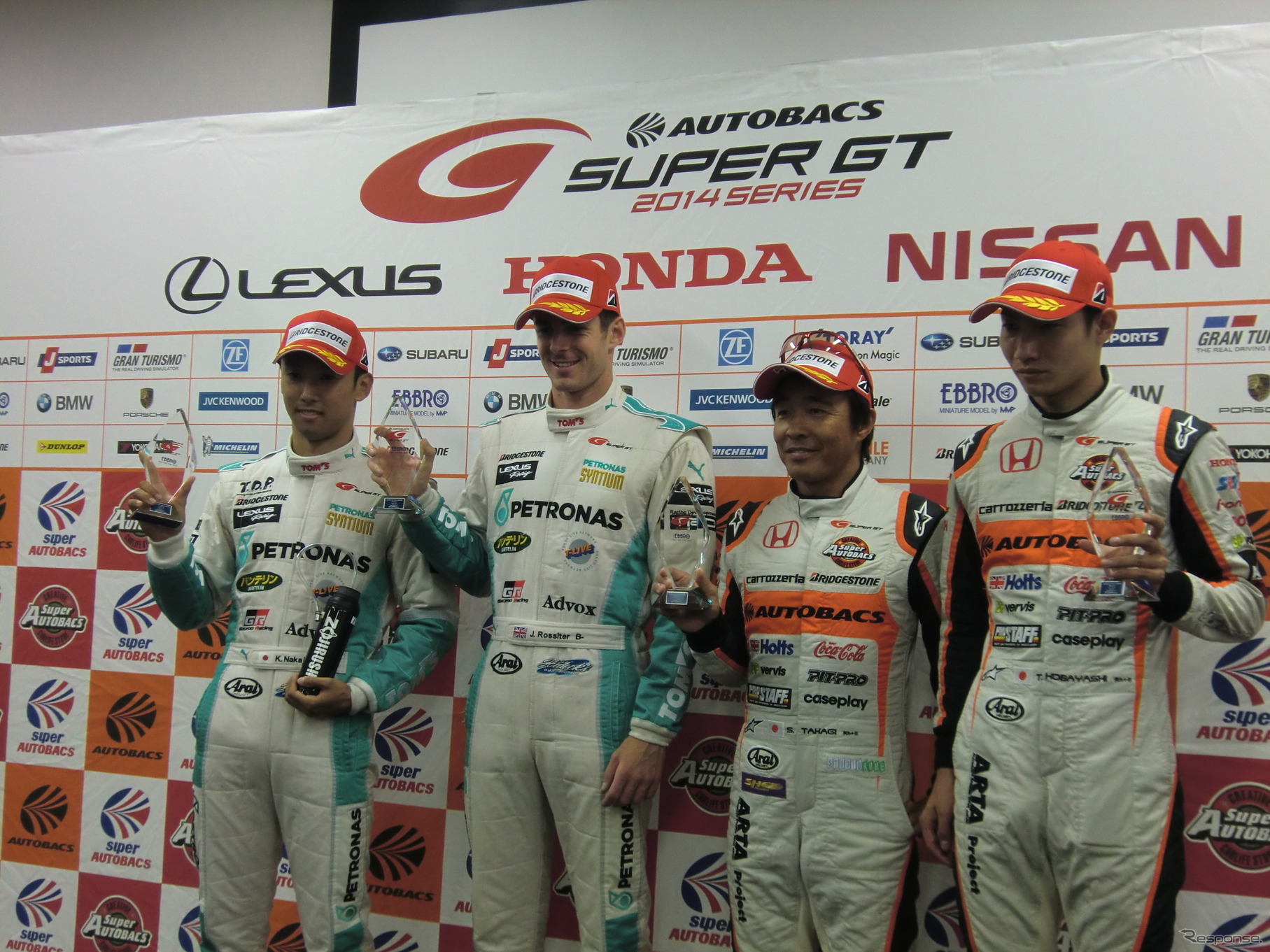 左からGT500ポールの中嶋一貴、J.ロシター、GT300ポールの高木真一、小林崇志。