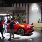 マツダの営業赤字539億円、関税・為替影響で減収減益　中間決算