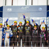 2014年のWEC富士戦、LMP2クラスで表彰台を獲得した井原選手（向かって右、3位の段の中央）。