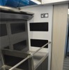 E257系2000・2500番台の1・9・10・14号車に設置される荷物置き場。