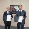 がん研究会 馬田一理事長（右）と国際自動車 西川洋志社長