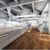 北陸新幹線敦賀駅のホームデザイン。床は船の甲板をイメージして木調タイルで仕上げられる。待合室も船をモチーフとしている。