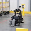 SLAM式キーカート。宛先別仕分けができたかご車をトラックバースまで運ぶ