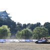 名古屋城を背に疾走するラリーカー