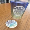 チェックインすると特性カップとステッカーがもらえる