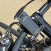 付属する自転車用クレードル。ワンタッチでCN-MC01Lを取り付けられる