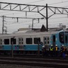 現地搬入された青い森鉄道の新車「青い森703系」。2014年3月から運用を開始する予定。