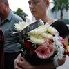 マレーシア航空17便の犠牲者に祈りを捧げる関係者
