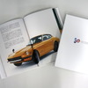 プレゼント 日産 80years of moving people