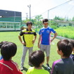 カルダレッリ選手（後右）の指揮するチームは、モトクロスの小島選手（後左）が助っ人。