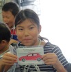 「整備・塗装職業体験」と「モノづくり体験」に参加する子どもたち（Be a driver. Experience at FUJI SPEEDWAY）