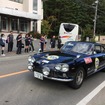ちょうど合宿で西湖を訪れていたチームの面々、配布されたエントラントリストと照らし合わせて、ドライバー、コ・ドライバーの名前を呼んで声援を送っていた。