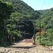 最も被害が大きい海浦～佐敷間の佐敷トンネルの状況（7月30日時点）。土石流がトンネル坑口で向きを変えて軌道に流れ込んだ。