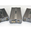 外部パワーアンプの一例（DLS・CCシリーズ、左から4chモデル、1chモデル、2chモデル）。
