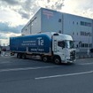日本郵便 熊本北郵便局からT2のコンテナを積んだ日本郵便のトラックが出発