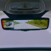 ジェンテックスの最新「フルディスプレイミラー（FDM）」。車両側の「ブラインドスポットモニタリング」と連動し、死角を表示する機能が備わっている。