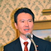 「この分野のビジネスがますます拡大していかないといけない」と話す加藤公一法務副大臣（撮影＝中島みなみ）