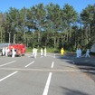 初日の散水は環境管理棟の南側駐車場で実施された