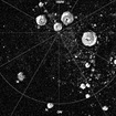 水星の北極地方の写真。画像処理で、日陰の部分を白くしている。　NASA/Johns Hopkins University Applied Physics Laboratory/Carnegie Institution of Washington/National Astronomy and Ionosphere Center, Arecibo Observatory. 
