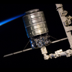 国際宇宙ステーション第37次長期滞在クルーが撮影した、シグナス補給船とロボットアーム